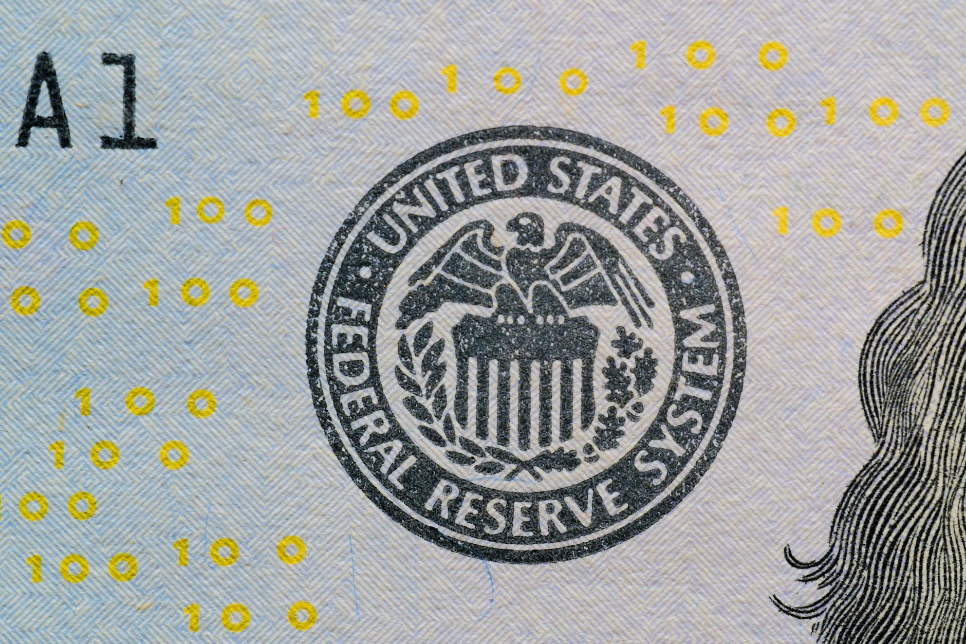 Detailed view of the US Federal Reserve System seal on currency