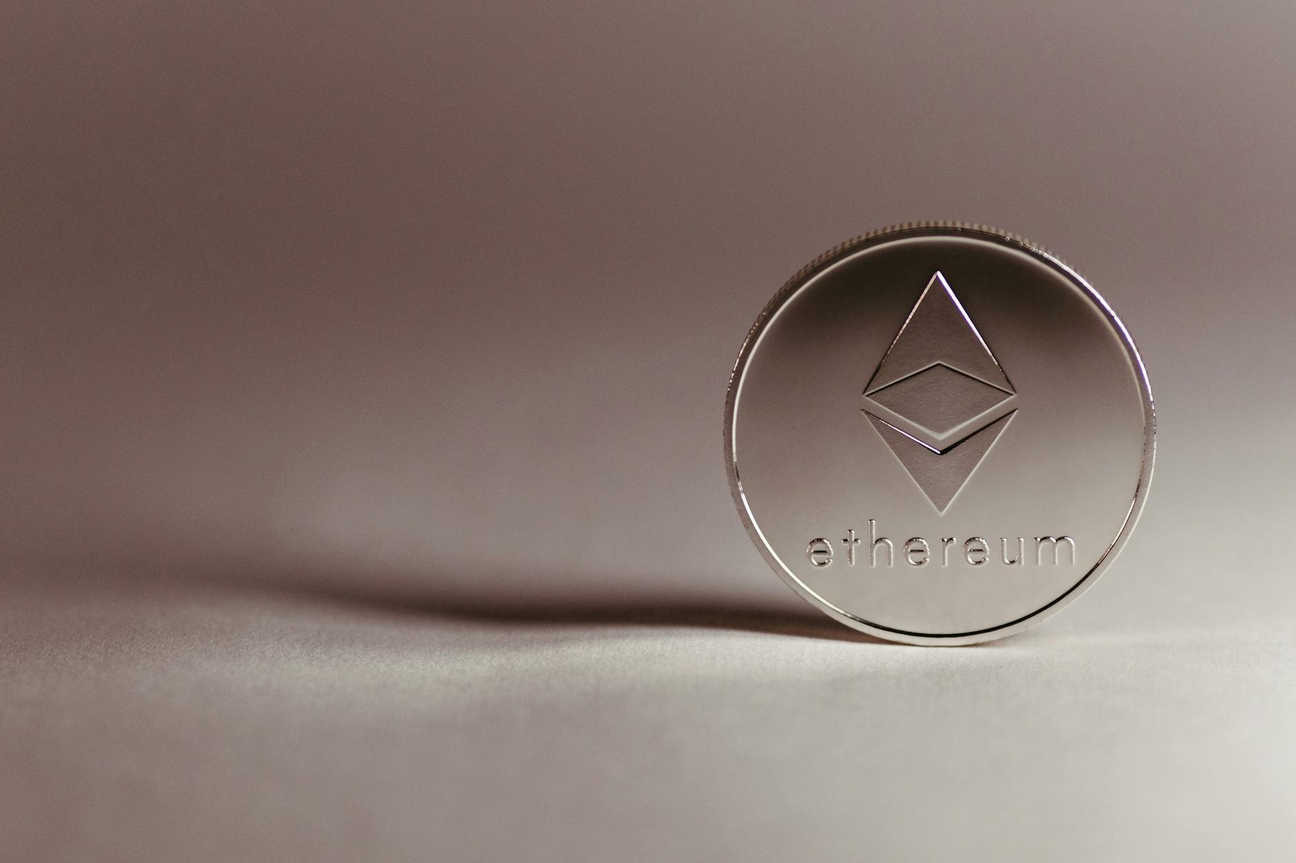 Close-up of an Ethereum coin against a dark surface, illustrating Tom Lee's bullish ETH price call