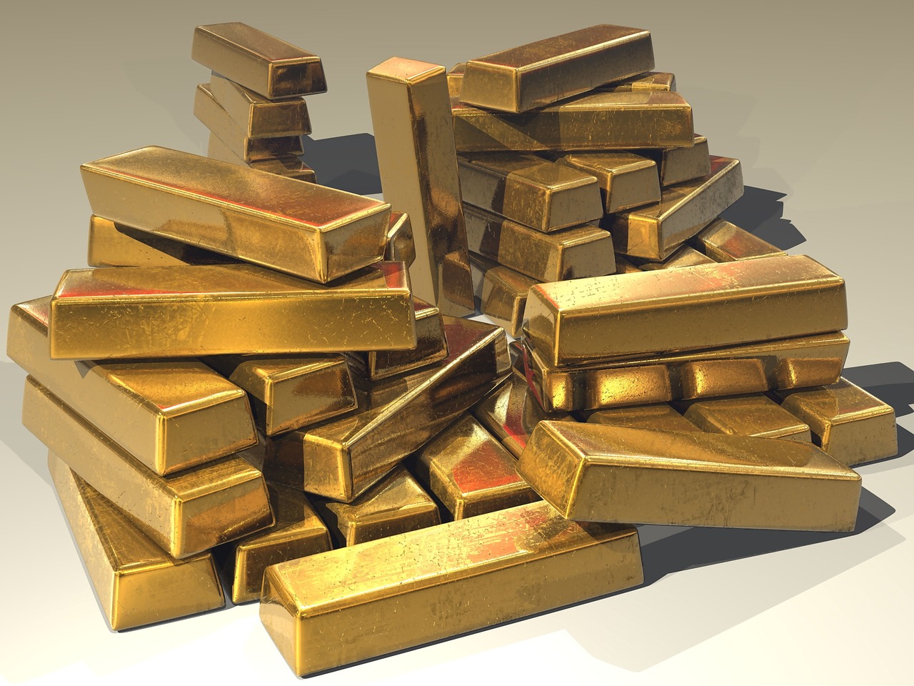Stacked gold bullion bars representing wealth and investment