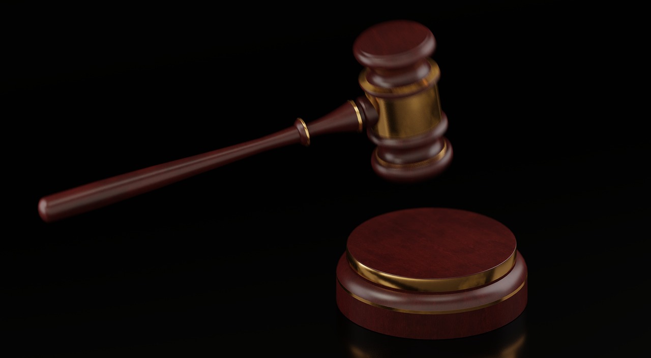 A wooden gavel on a desk, representing a legal or auction decision, relevant to eBay's rejection of GameStop's takeover bid