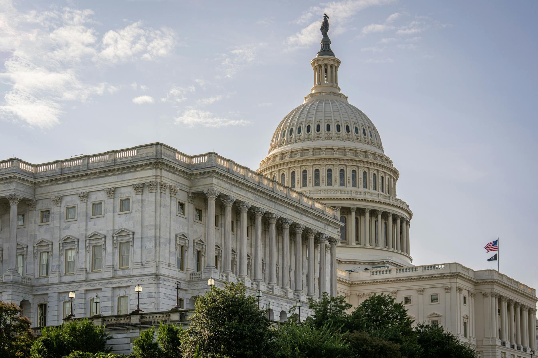 Stunning daytime view of the US Capitol Building in Washington DC, showcasing its architectural grandeur and iconic dome.