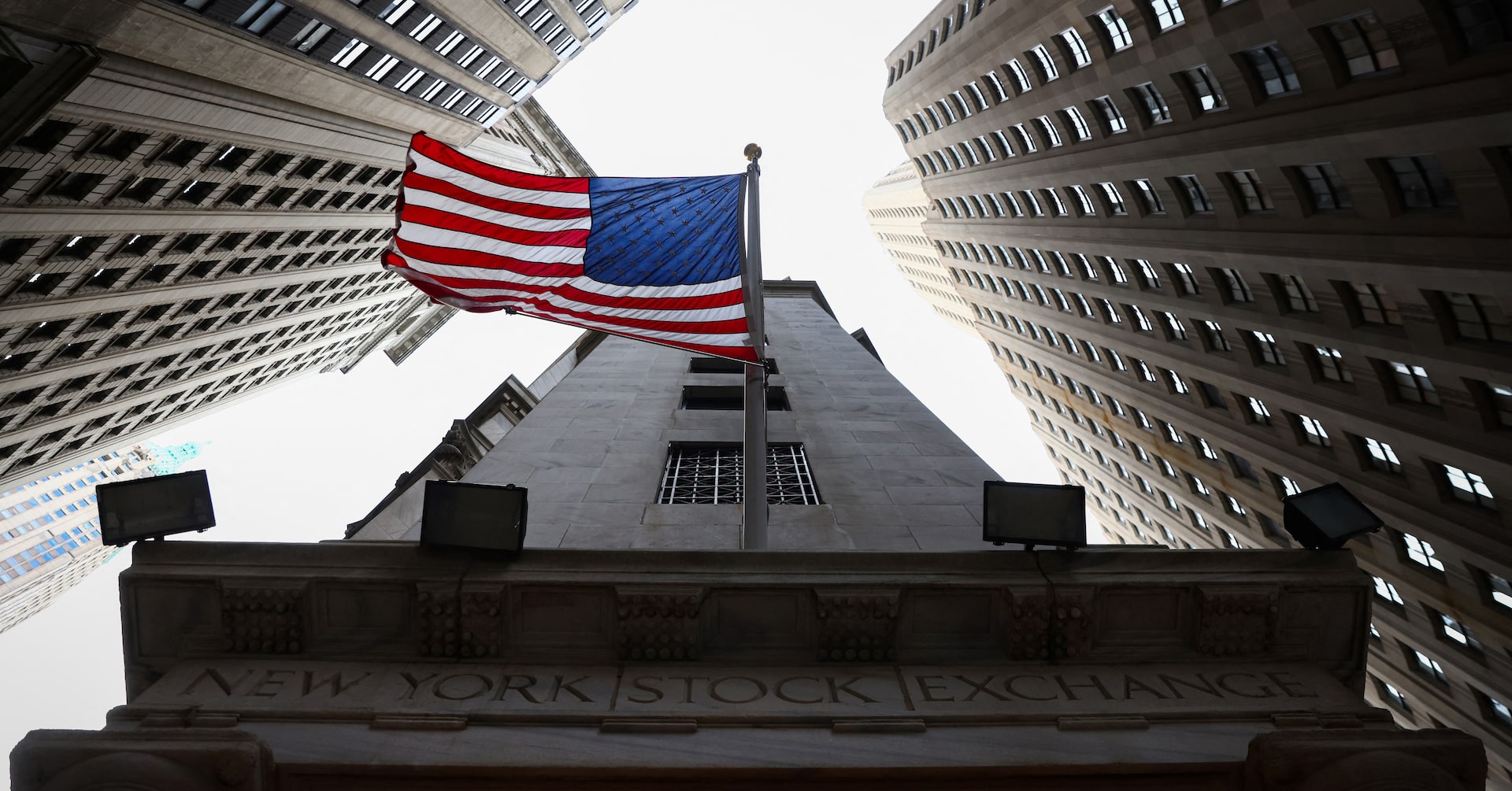 A U.S. flag is seen outside the New York Stock Exchange