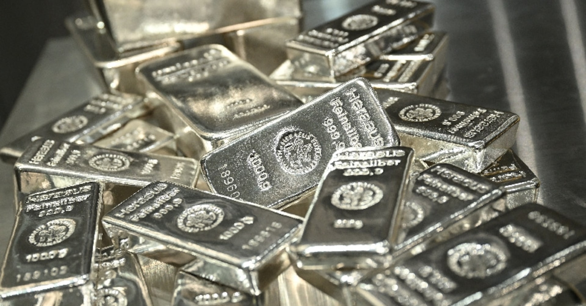 Silver bars are stacked in the safe deposit boxes room of the Pro Aurum gold house in Munich, Germany, January 10, 2025. REUTERS/Angelika Warmuth