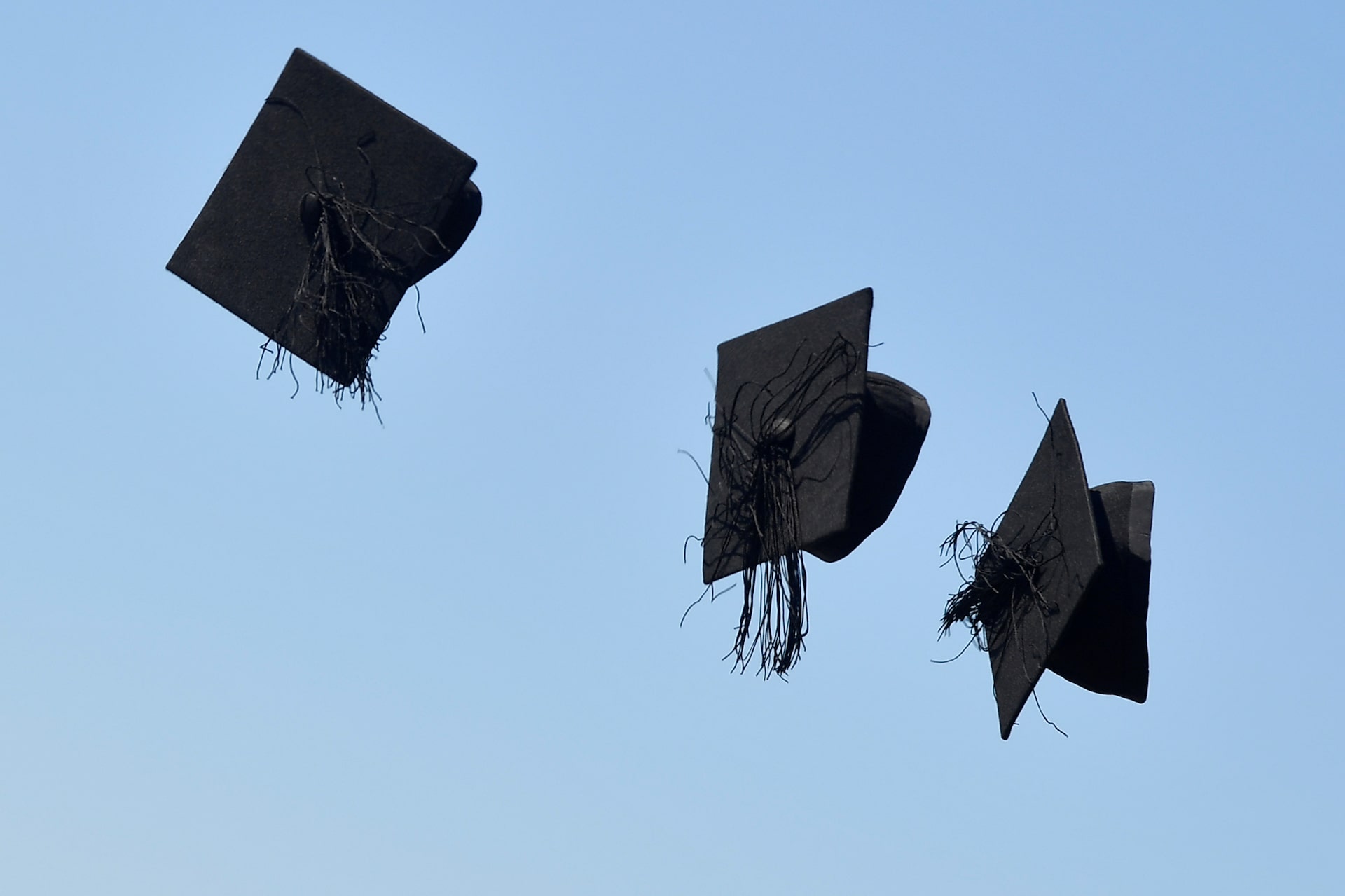 Graduation caps at a commencement ceremony