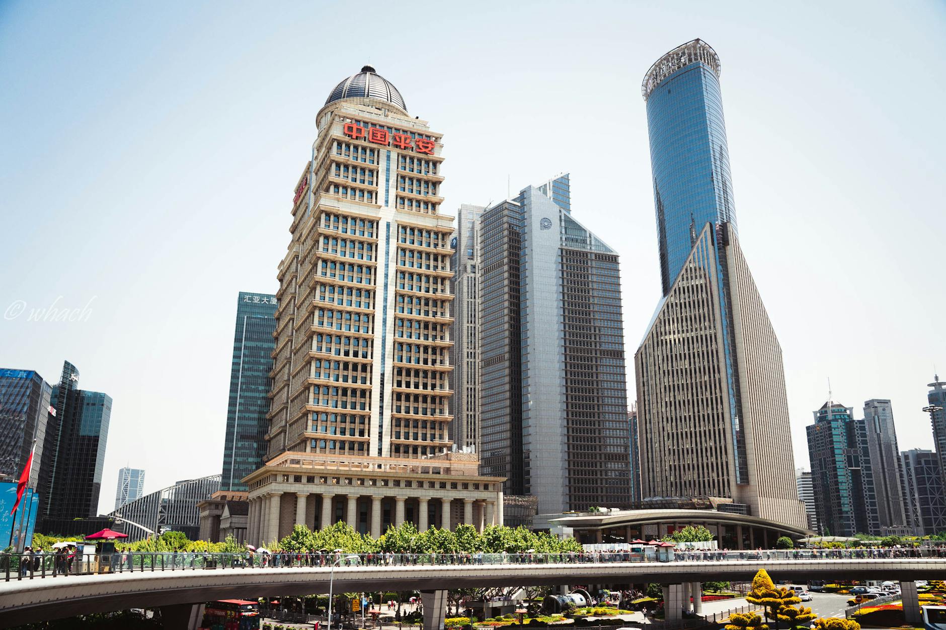 Skyscrapers in Shanghai's financial district as China's government bond rally diverged from rising global yields.