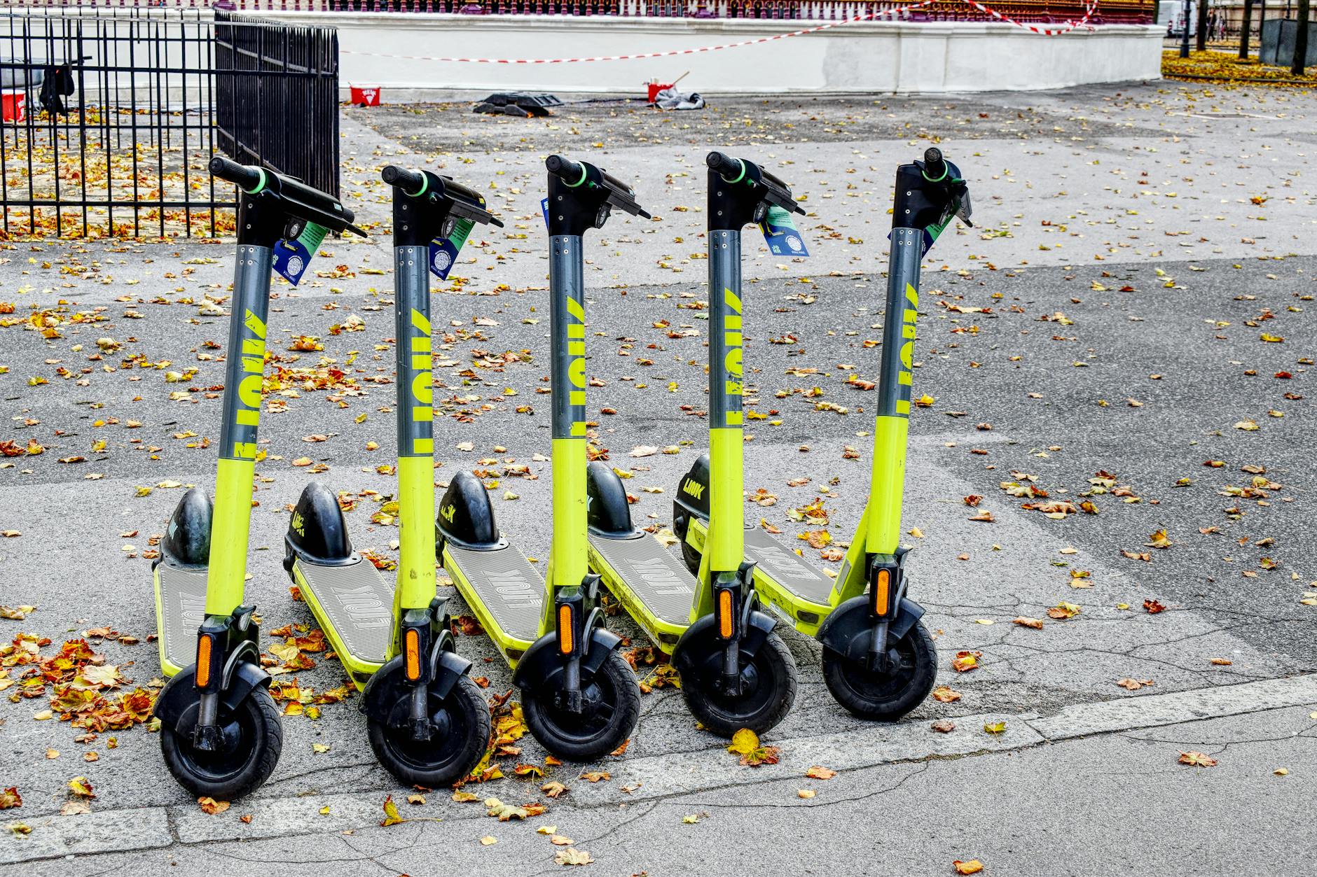 Lime scooter parked on a city street