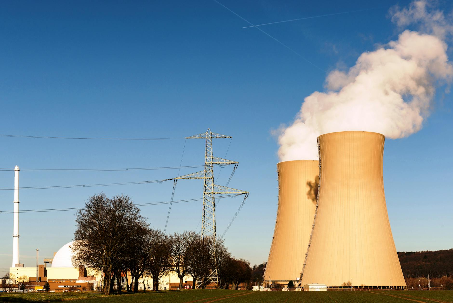 Cooling towers and transmission lines at a power-generation plant