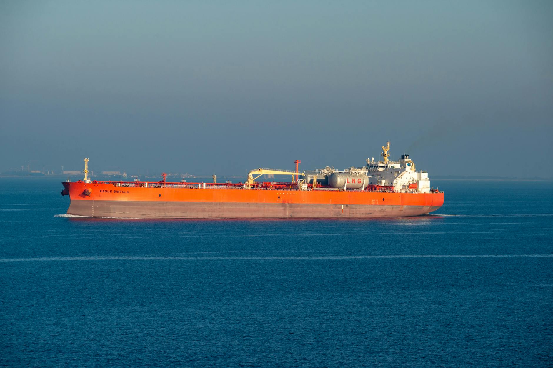 LNG carrier at sea, reflecting the shipping and export risk around the Strait of Hormuz.