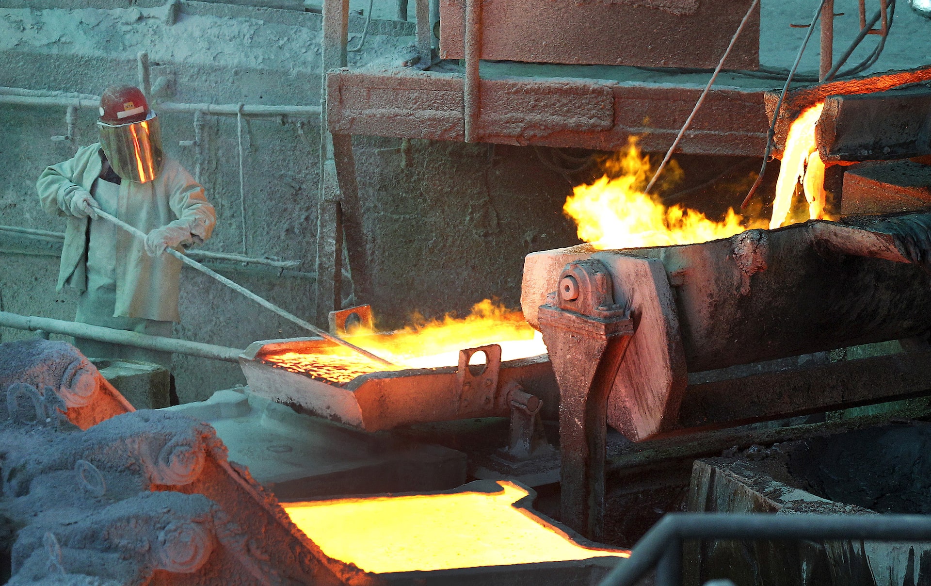 A worker monitors a process at the copper smelter of Codelco Ventanas in Ventanas city, Chile.