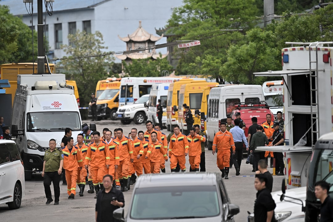 Rescuers at the Liushenyu coal mine site after the gas explosion