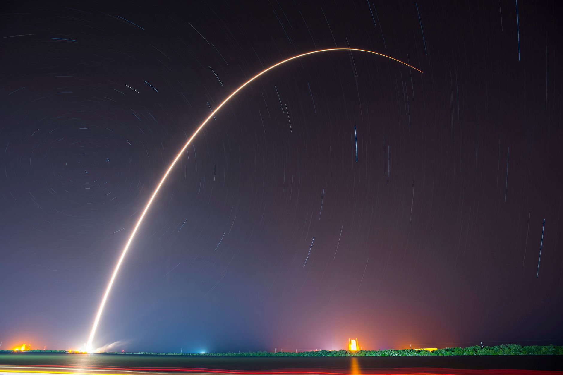 Rocket launch under a starry night sky as investors brace for a landmark SpaceX float