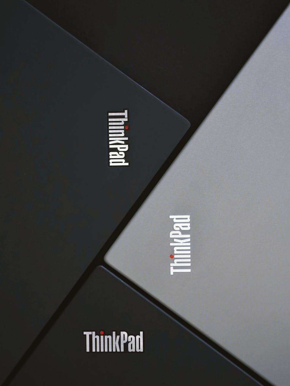 ThinkPad laptops on display, illustrating the PC business that helped drive Lenovo's quarterly revenue beat.