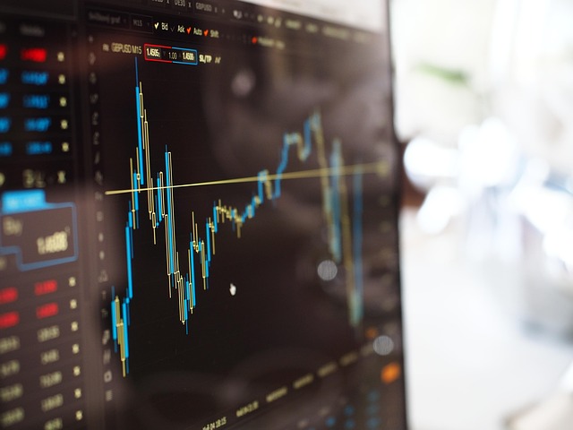 Blurred market chart on a trading screen, reflecting the immediate ONDO token reaction to Ondo Finance's leadership shock.