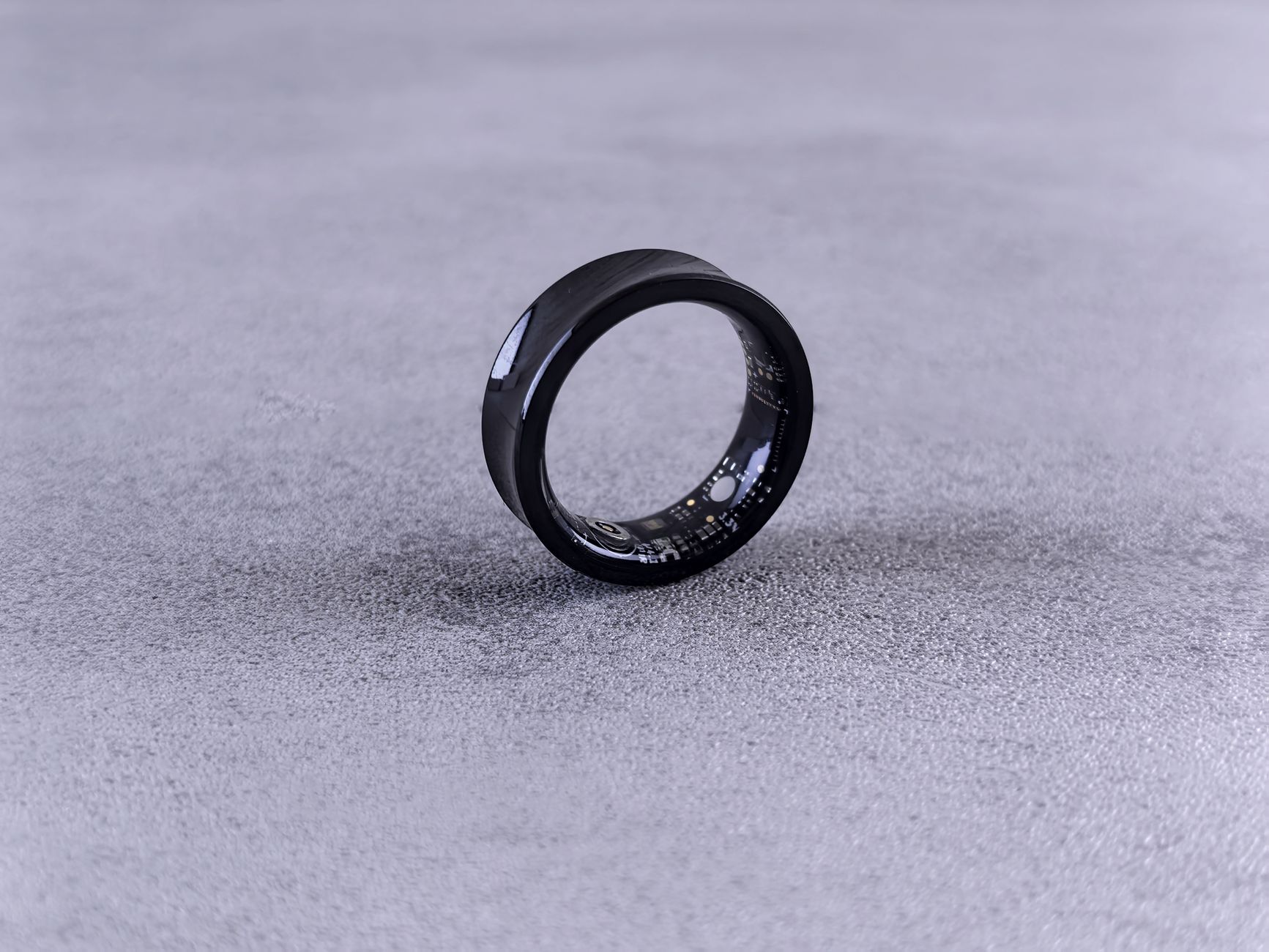Oura smart ring and wearable technology illustration
