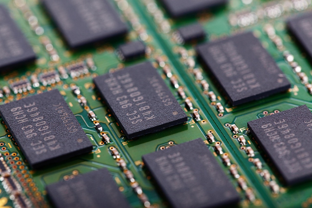 Close-up of memory-chip circuitry illustrating the AI-driven rerating of memory stocks.