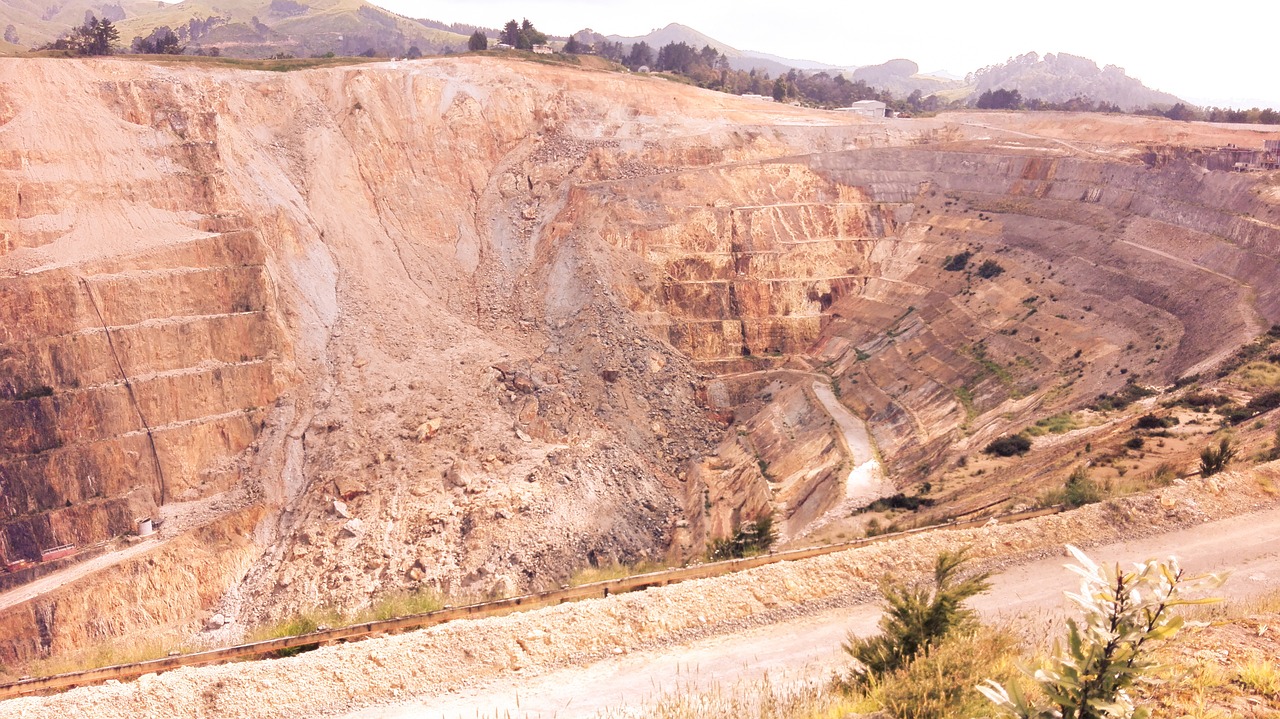 Open-pit gold mine site representing large-scale bullion production