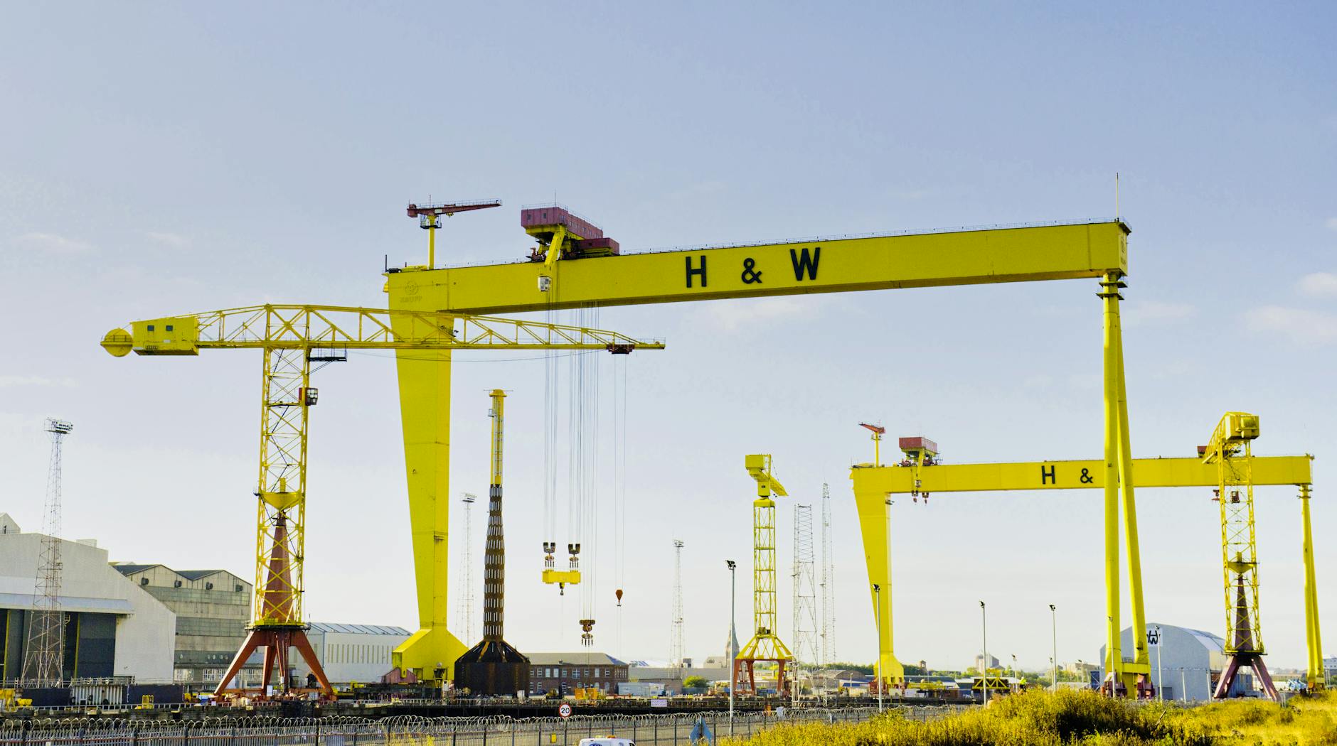 Harland & Wolff cranes in Belfast, a symbol of the UK shipbuilding supply chain targeted by new procurement guidance.