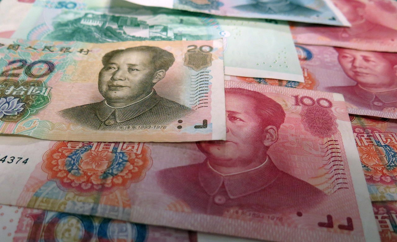 Chinese yuan banknotes arranged in a close-up view