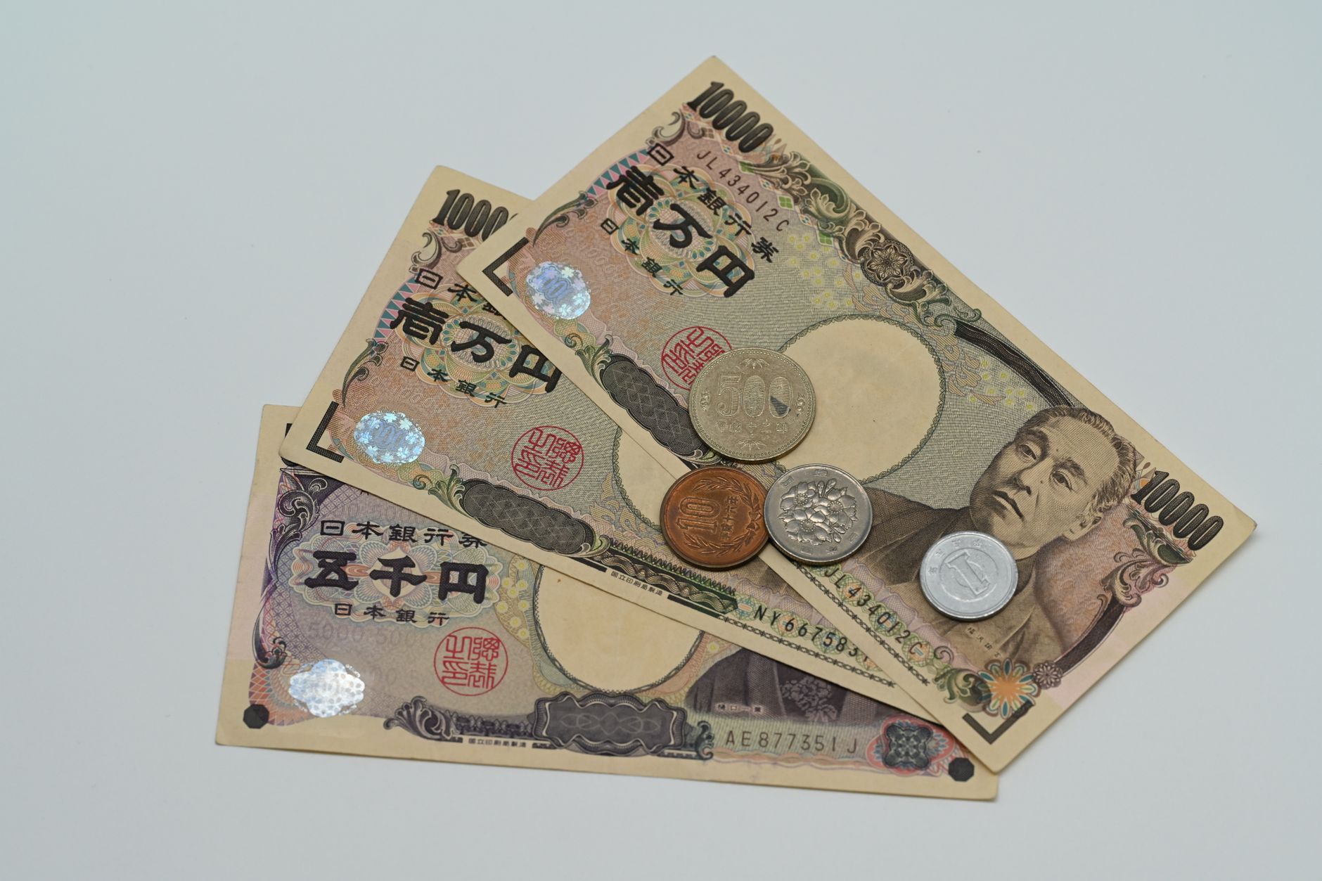 Japanese yen banknotes and coins, reflecting currency-market focus around the Bank of Japan rate path