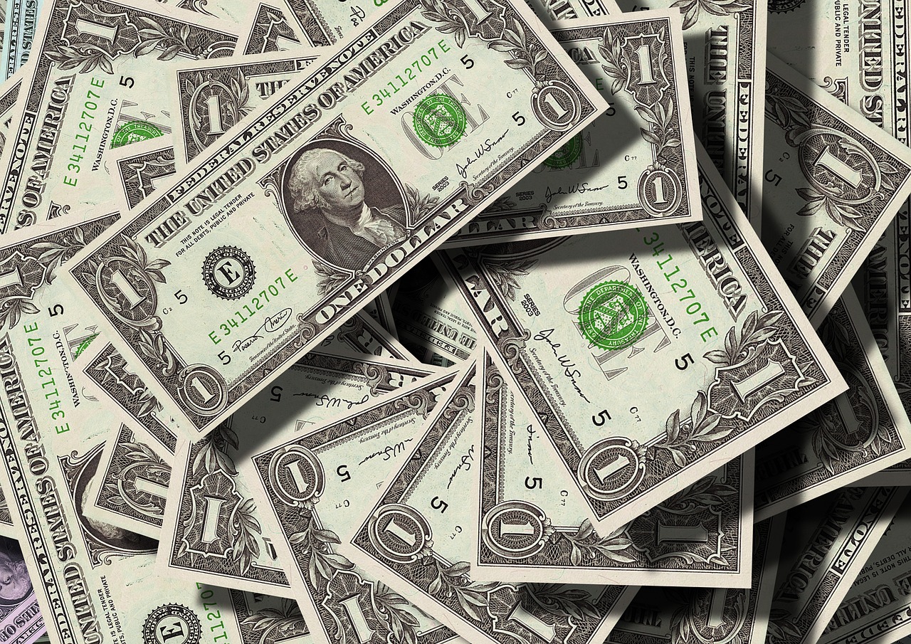 US dollar banknotes representing deposits at risk from digital payment rails.
