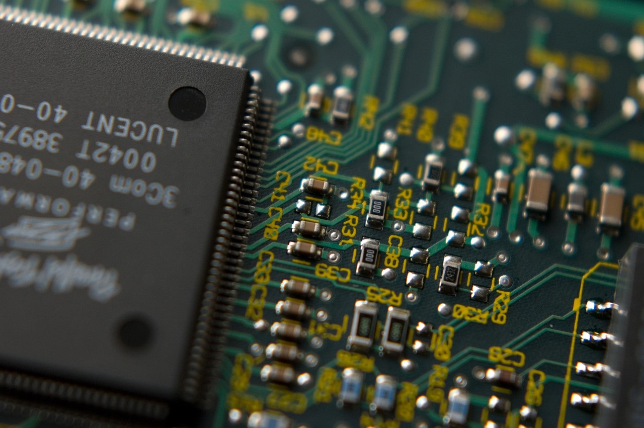 Close-up of a semiconductor chip on a circuit board.