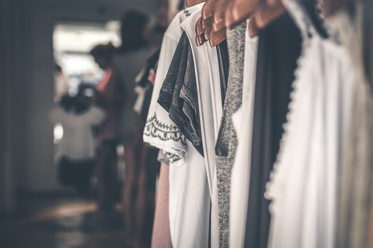 Boutique clothing store interior with womenswear displays