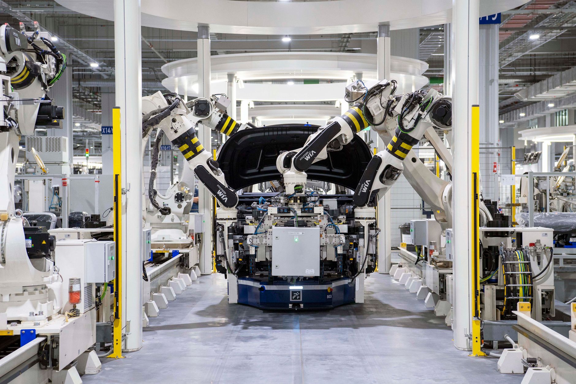 Automated vehicle assembly line inside a car factory